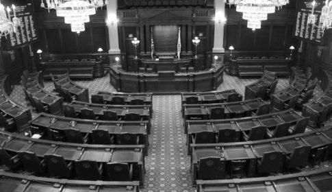 Empty black and white legislative chamber at the Illinois state capitol