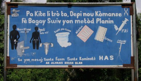 A billboard in Haiti showing various forms of birth control