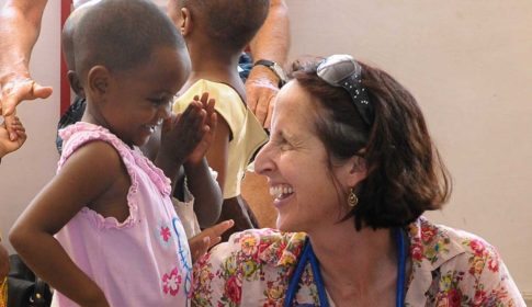 Dr. Trish Scanlan with a young girl