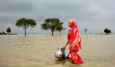 Climate victim Rahima Khatun (49) lives at Khanpur village in Rajshahi, Bangladesh. Her only deep tube well has been flooded and everyday she has to go to another village to collect pure drinking water.