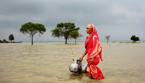 Climate victim Rahima Khatun (49) lives at Khanpur village in Rajshahi, Bangladesh. Her only deep tube well has been flooded and everyday she has to go to another village to collect pure drinking water.