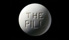 A model of The Pill on a black background