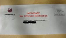 Envelope with the test IMPORTANT Sex Offender Notification, addressed to Owner or Current Occupant