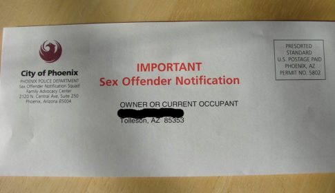Envelope with the test IMPORTANT Sex Offender Notification, addressed to Owner or Current Occupant
