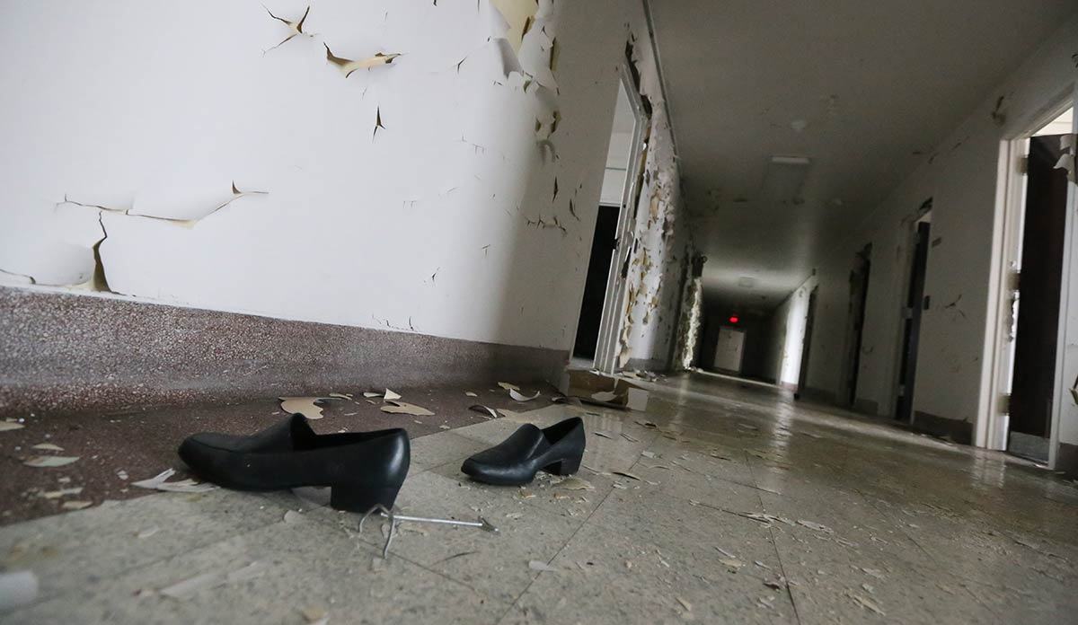 Abandoned shoes in the hallway of Herman Kiefer Health Complex