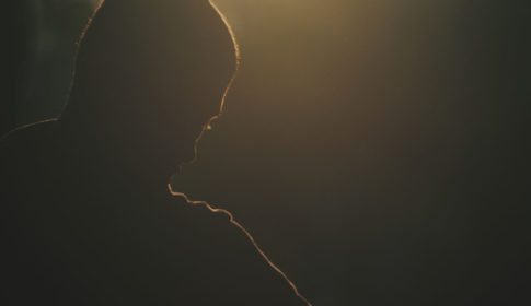 Silhouette of a young man