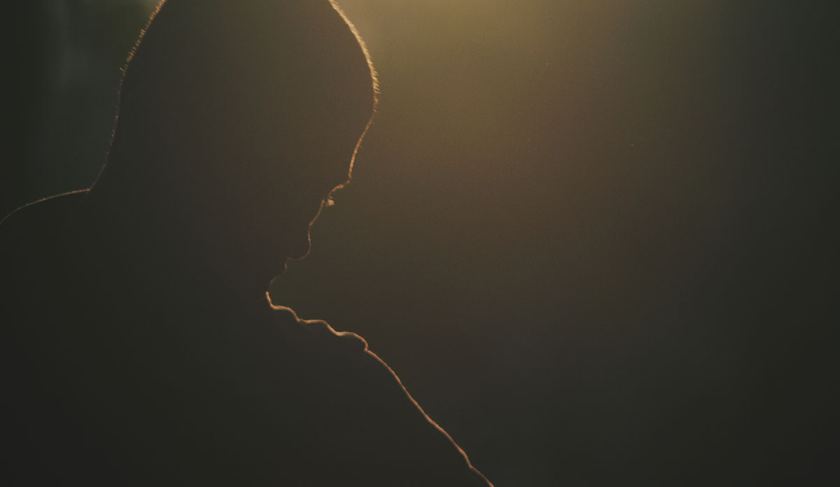 Silhouette of a young man