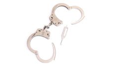 Two open handcuffs and key