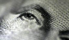 Closeup of George Washington's eyes on a dollar bill