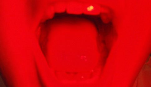 A red photo of an open mouth