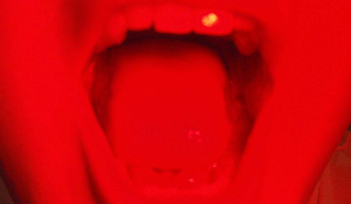 A red photo of an open mouth