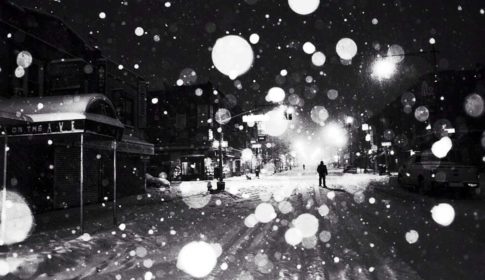 Figure during a snowstorm in New York City