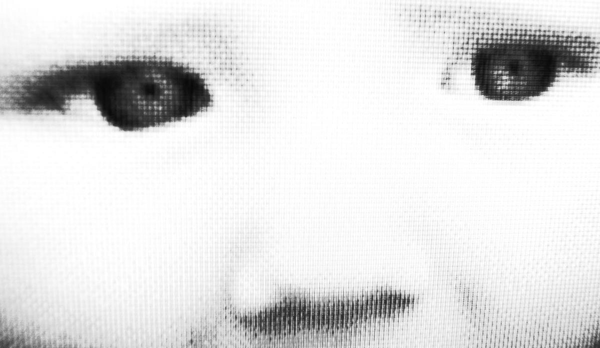 PIxellatd closeup of a baby's eyes and nose