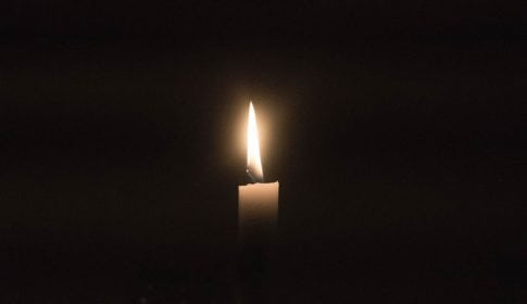 A single lit candle