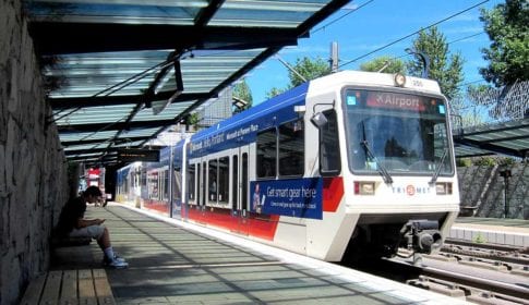 A light rail train in a station