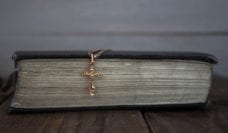 Book with a cross on it
