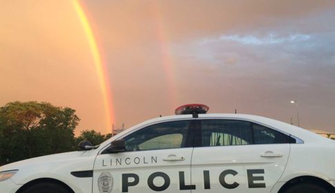 Lincoln Nebraska police car and a rainbow