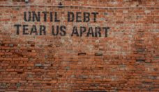 wall grafitti-until debt tear us apart