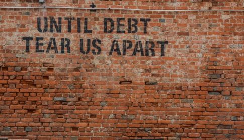 wall grafitti-until debt tear us apart