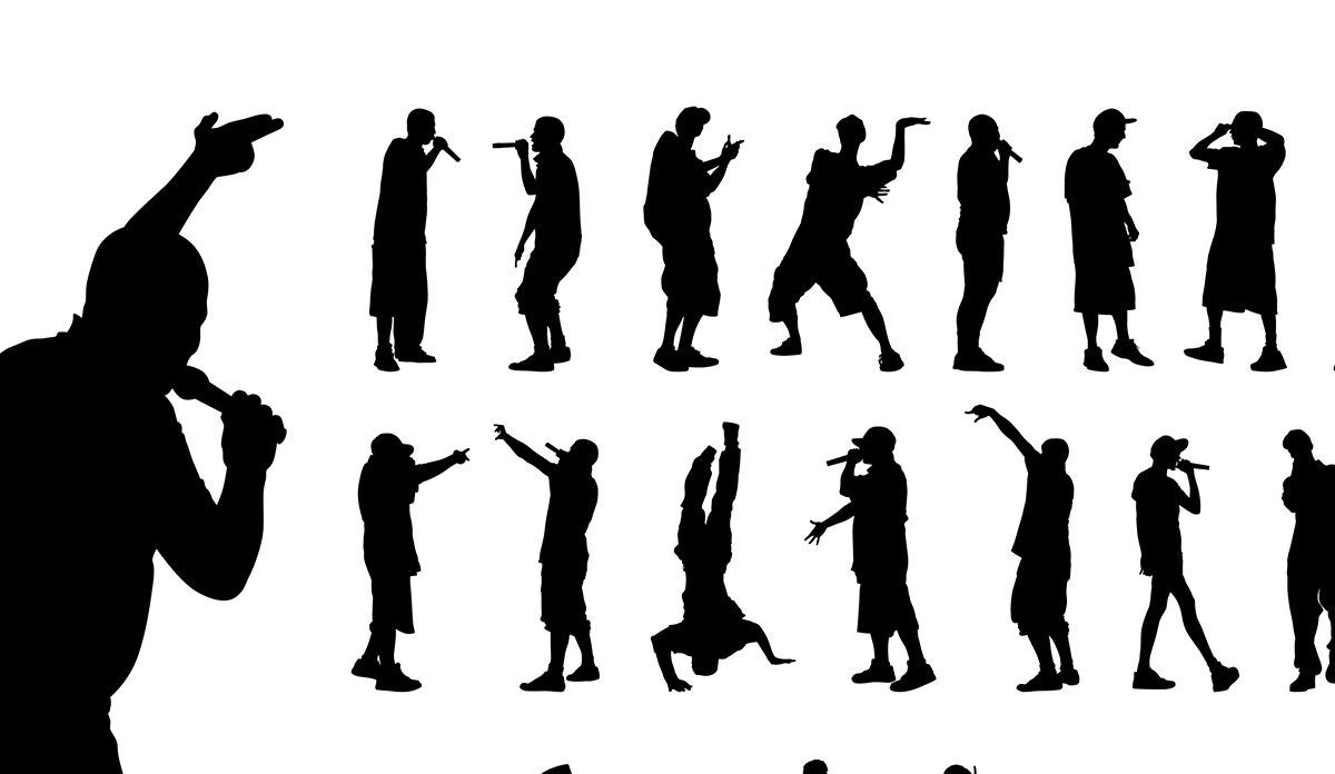 silhouettes of people singing and dancing