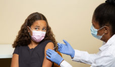 child getting vaccinated