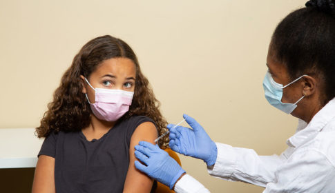 child getting vaccinated