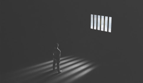 person alone in cell