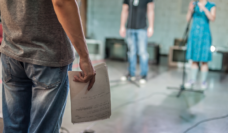 three people rehearse for their upcoming production