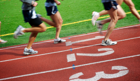 men running on track