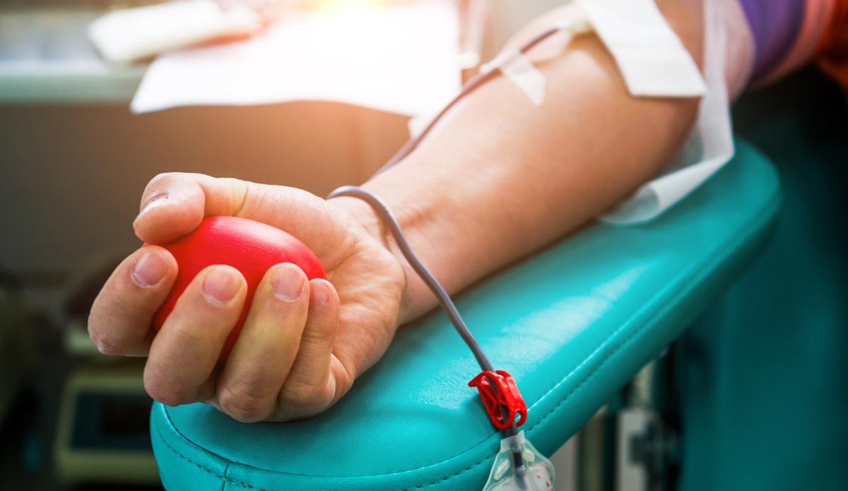 arm of patient participating in blood donation